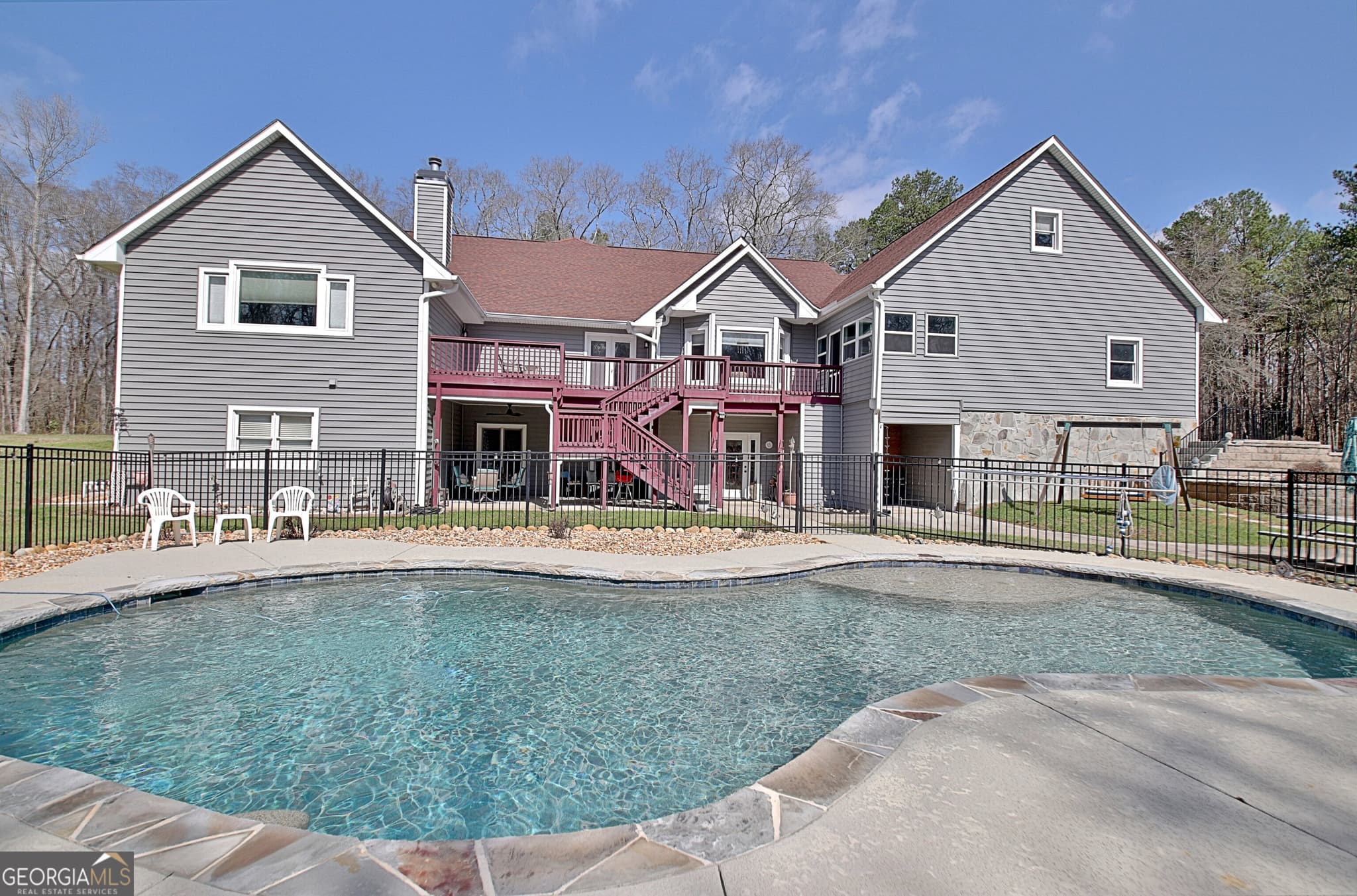 6 bedroom, 5.5 bathroom, 6,561 sq ft single family residence for sale at 967 Tope Road, Sharpsburg, GA 30277 — photo 2