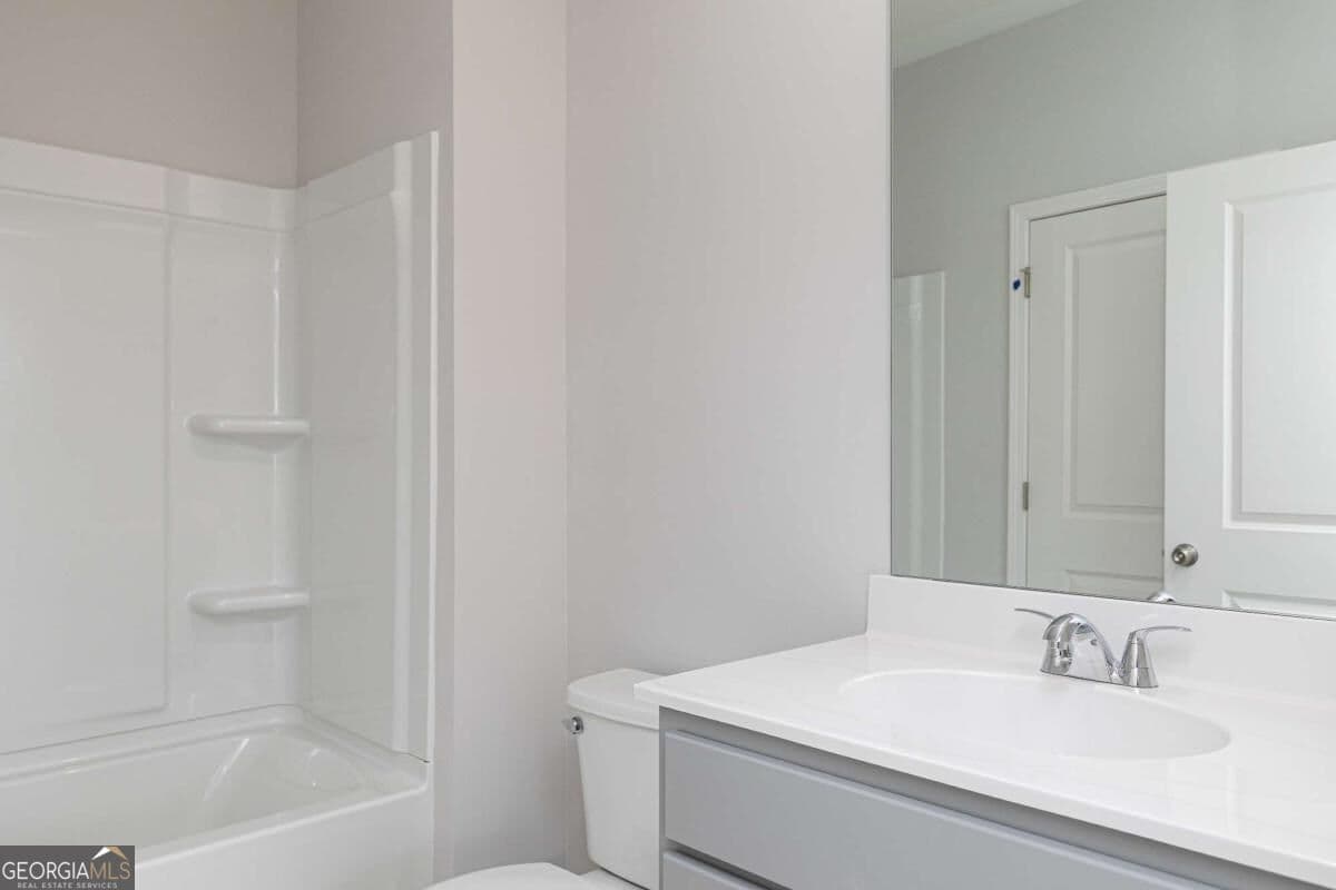 4 bedroom, 3 bathroom, 2,270 sq ft single family residence for sale at 651 Jasmine Woods Drive, Lawrenceville, GA 30046 — photo 7