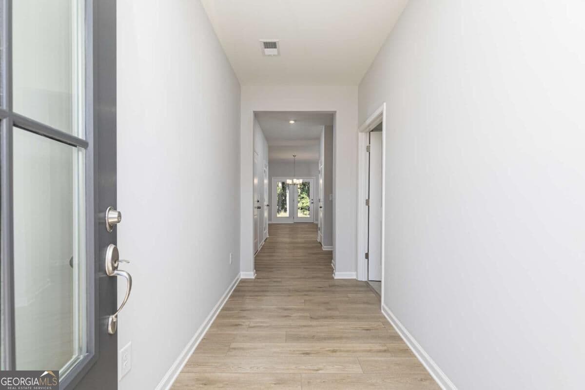4 bedroom, 3 bathroom, 2,270 sq ft single family residence for sale at 651 Jasmine Woods Drive, Lawrenceville, GA 30046 — photo 3