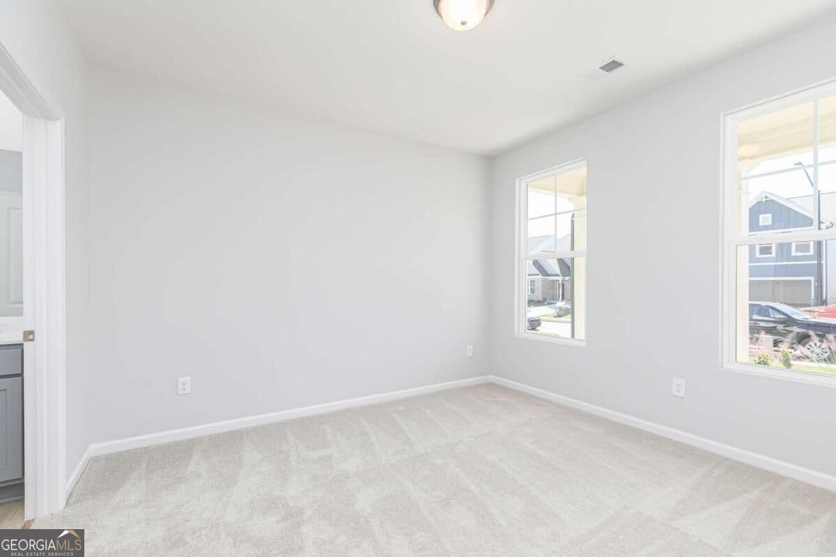 4 bedroom, 3 bathroom, 2,270 sq ft single family residence for sale at 651 Jasmine Woods Drive, Lawrenceville, GA 30046 — photo 5