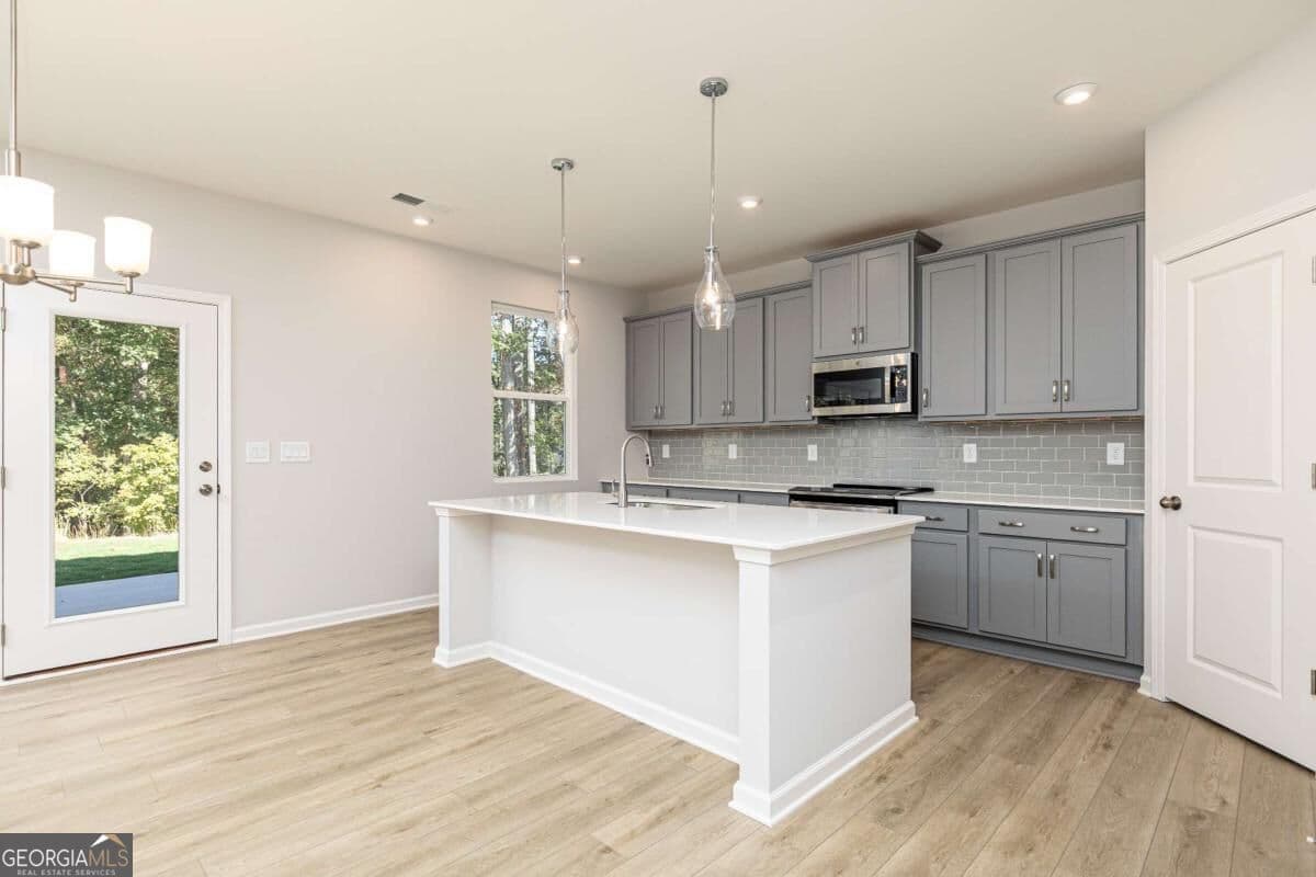 4 bedroom, 3 bathroom, 2,270 sq ft single family residence for sale at 651 Jasmine Woods Drive, Lawrenceville, GA 30046 — photo 10