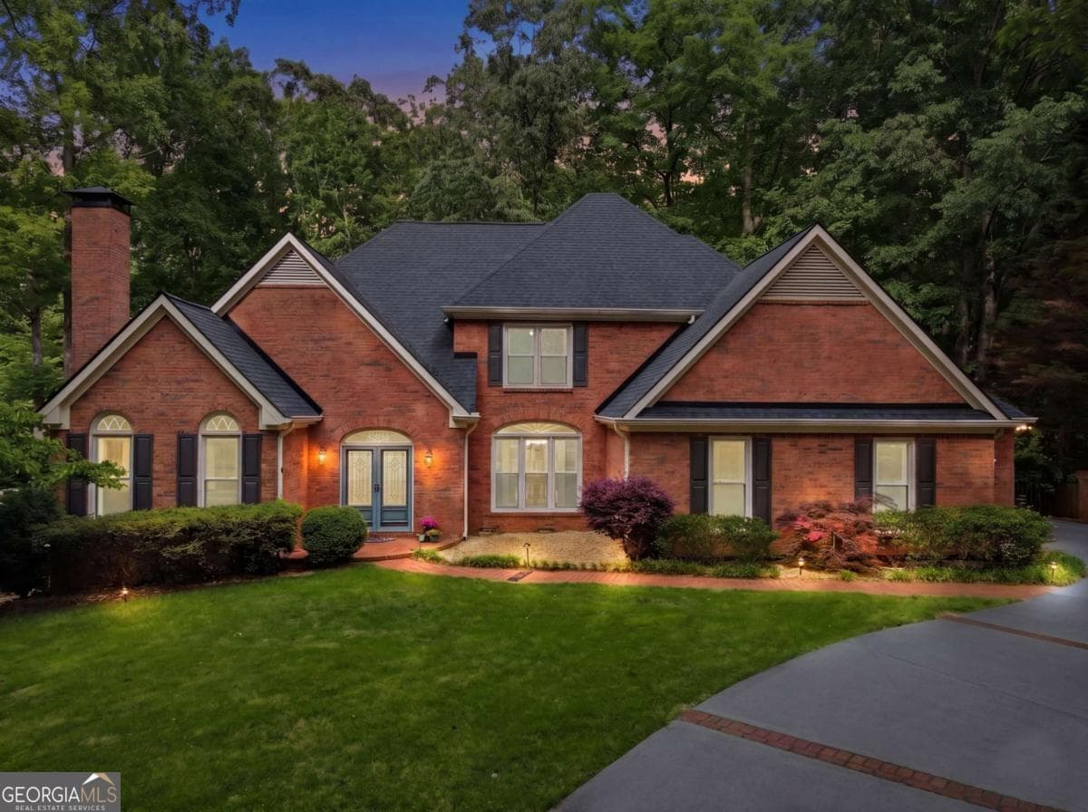 3 bedroom, 2.5 bathroom, 2,736 sq ft single family residence sold at 5215 Overbend Trail, Suwanee, GA 30024