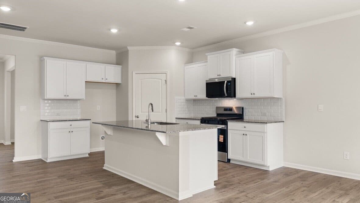 5 bedroom, 3 bathroom, 2,511 sq ft single family residence for sale at 499 Thompson Drive, Dallas, GA 30132 — photo 6