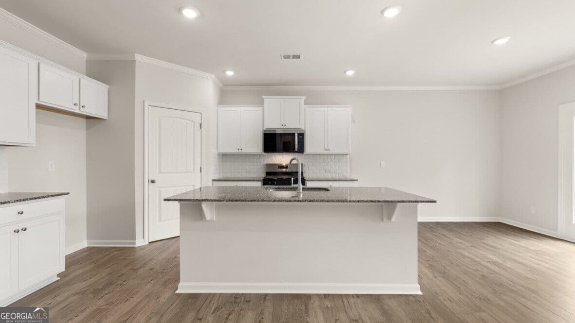 5 bedroom, 3 bathroom, 2,511 sq ft single family residence for sale at 499 Thompson Drive, Dallas, GA 30132 — photo 5