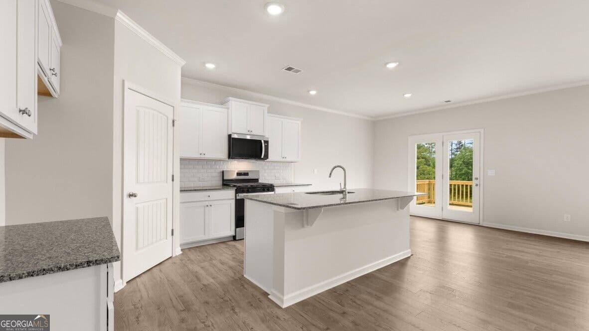 5 bedroom, 3 bathroom, 2,511 sq ft single family residence for sale at 499 Thompson Drive, Dallas, GA 30132 — photo 4