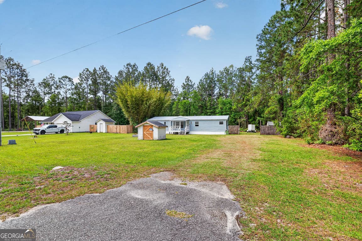 3 bedroom, 2 bathroom, 1,440 sq ft manufactured home,single family residence for sale at 155 Pine Crossing Street, Woodbine, GA 31569 — photo 2