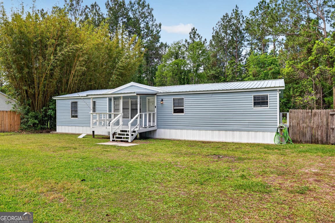 3 bedroom, 2 bathroom, 1,440 sq ft manufactured home,single family residence for sale at 155 Pine Crossing Street, Woodbine, GA 31569 — photo 3