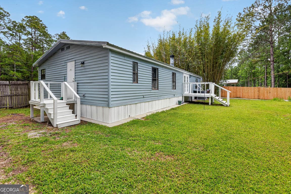3 bedroom, 2 bathroom, 1,440 sq ft manufactured home,single family residence for sale at 155 Pine Crossing Street, Woodbine, GA 31569 — photo 5