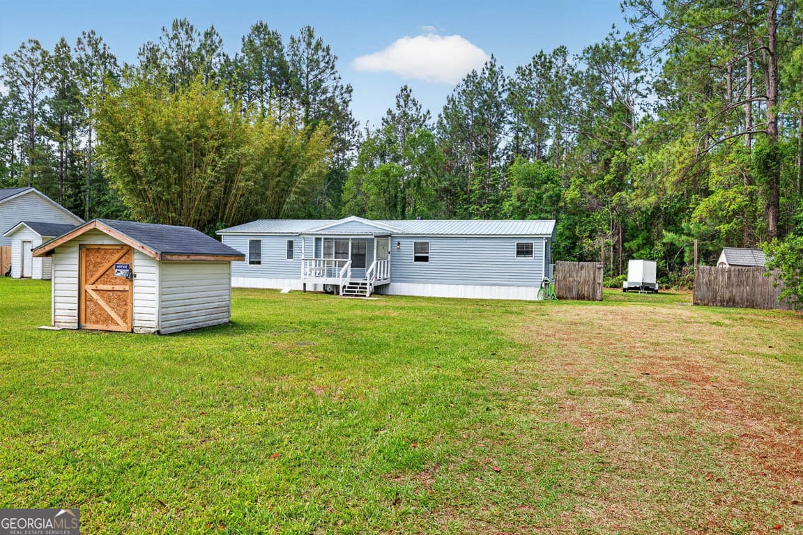 3 bedroom, 2 bathroom, 1,440 sq ft manufactured home,single family residence for sale at 155 Pine Crossing Street, Woodbine, GA 31569 — photo 4