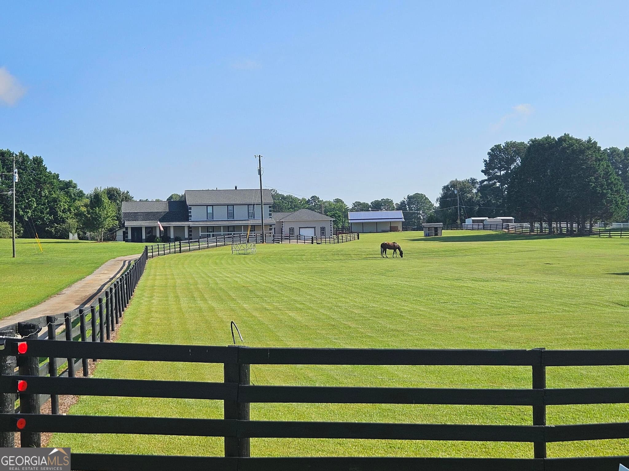 5 bedroom, 4 bathroom, 3,516 sq ft single family residence for sale at 351 Moose Lodge Road, Griffin, GA 30224 — photo 2