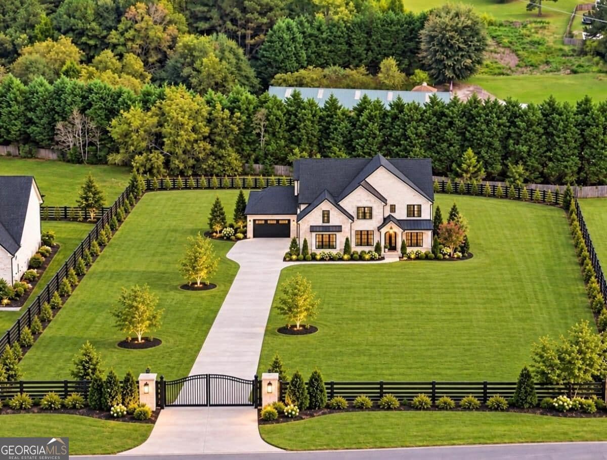 5 bedroom, 5.5 bathroom single family residence for sale at 1736 Lee Peters Road, Loganville, GA 30052
