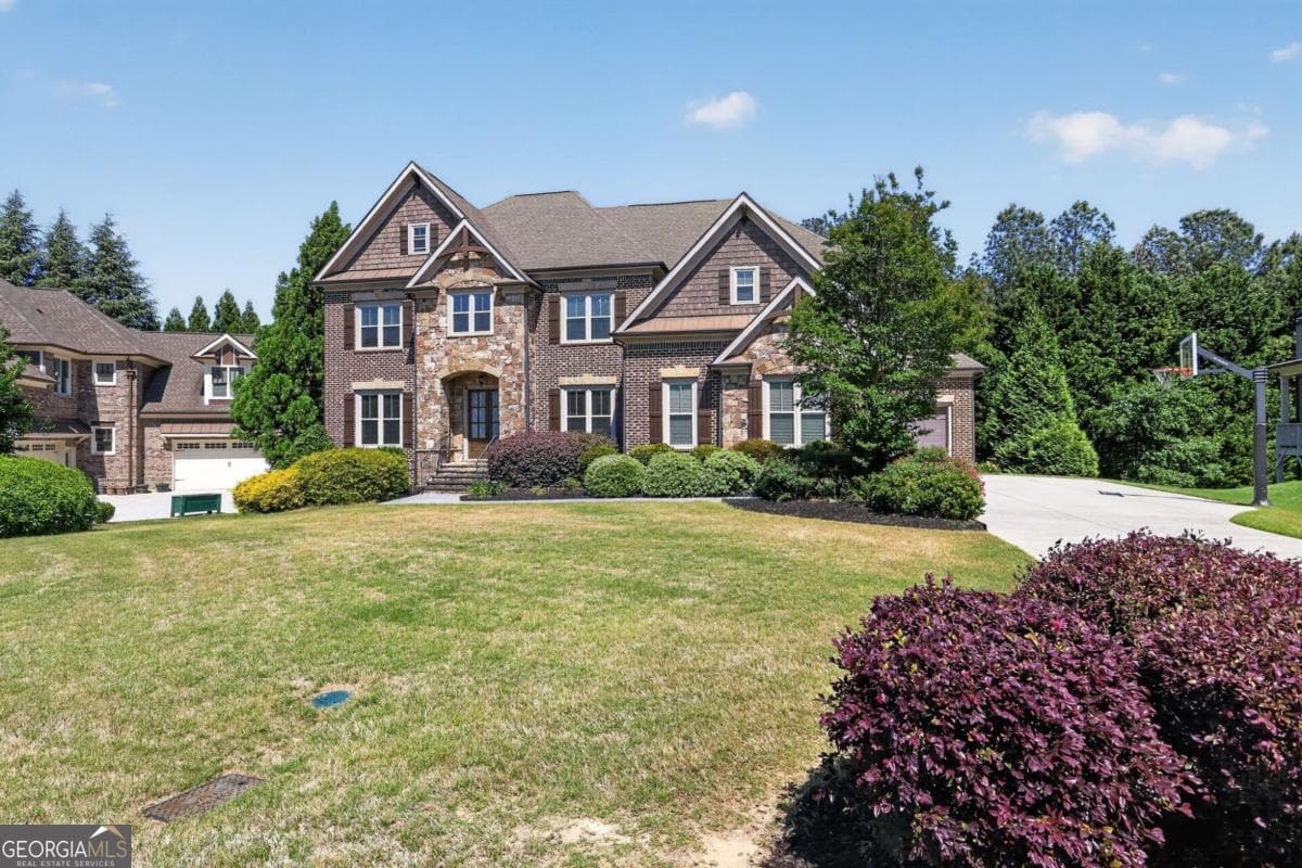 6 bedroom, 6 bathroom, 6,853 sq ft single family residence for sale at 2083 Skybrooke Lane, Hoschton, GA 30548 — photo 2
