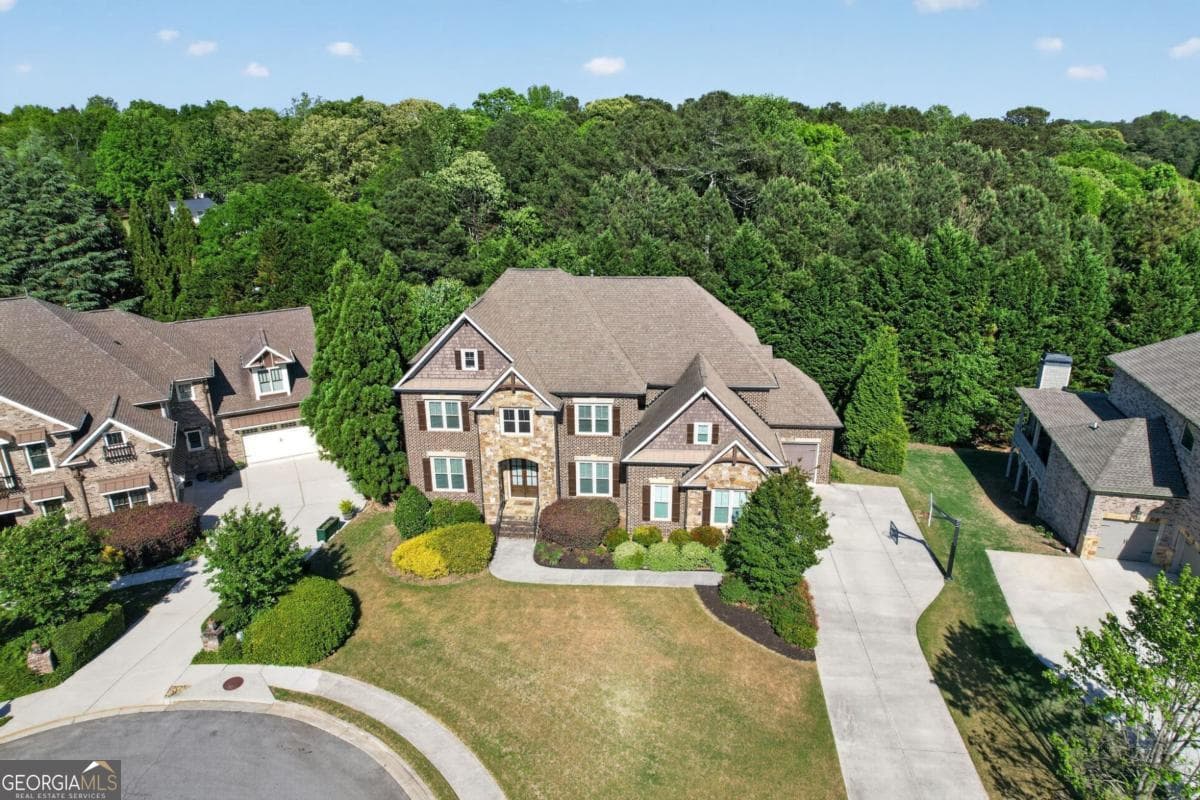 6 bedroom, 6 bathroom, 6,853 sq ft single family residence for sale at 2083 Skybrooke Lane, Hoschton, GA 30548 — photo 3