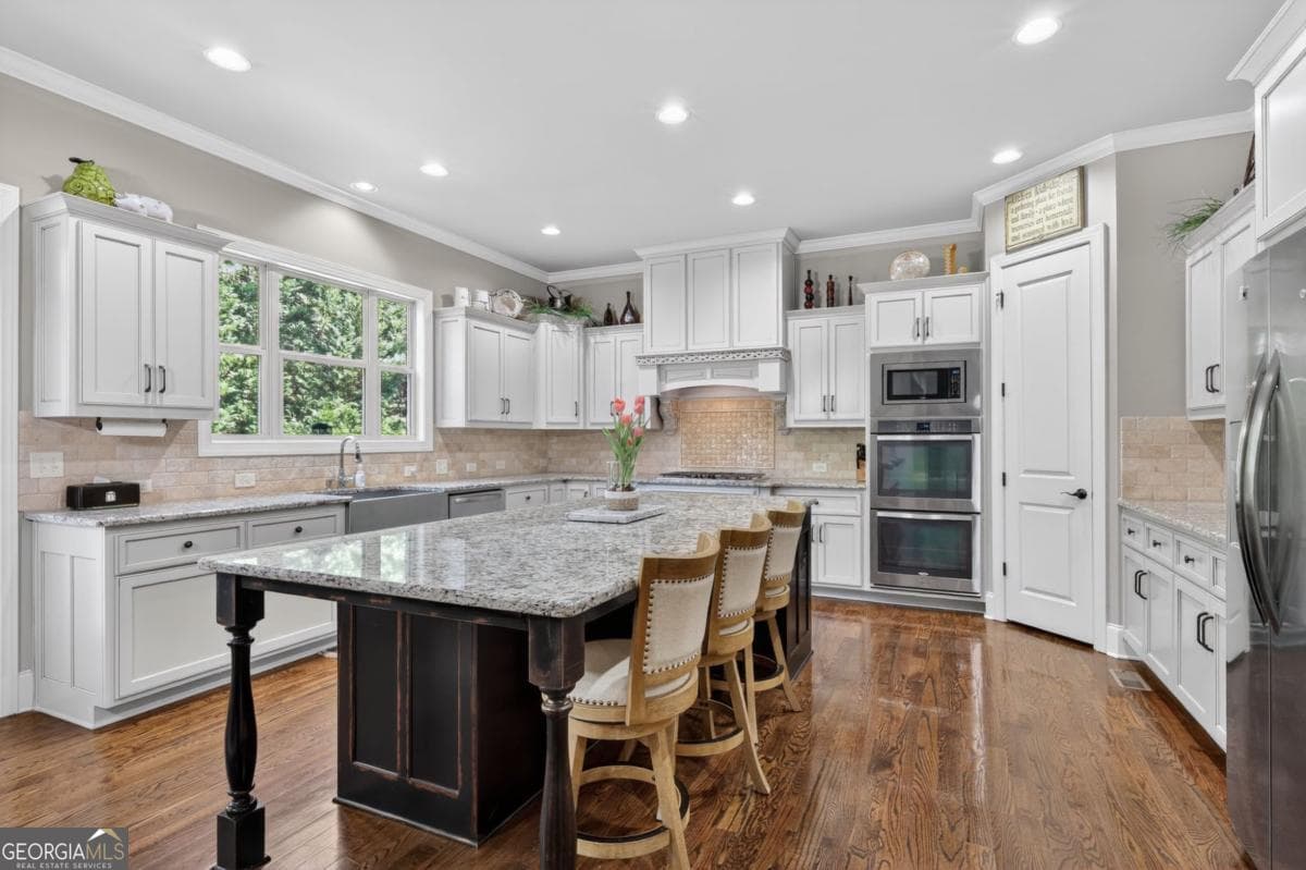 6 bedroom, 6 bathroom, 6,853 sq ft single family residence for sale at 2083 Skybrooke Lane, Hoschton, GA 30548 — photo 10