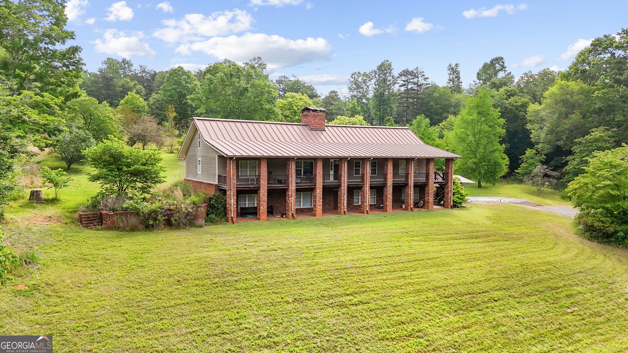 3 bedroom, 3.5 bathroom, 5,288 sq ft single family residence for sale at 4454 Ledan Extension, Gainesville, GA 30506 — photo 3