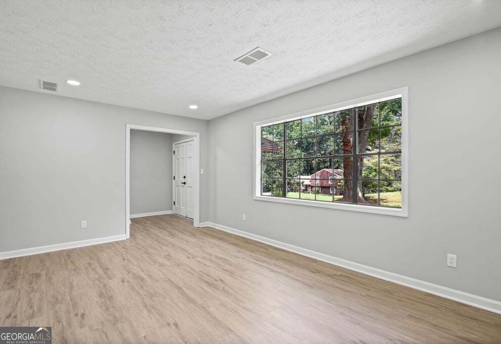 3 bedroom, 2.5 bathroom, 2,325 sq ft single family residence for sale at 6883 Creekmoor Lane, Riverdale, GA 30296 — photo 10