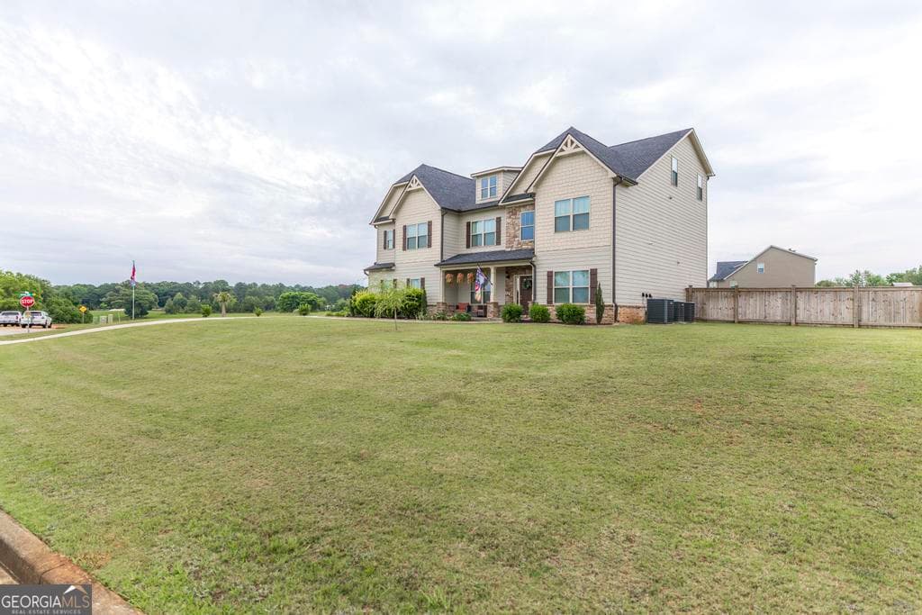 6 bedroom, 5 bathroom, 4,659 sq ft single family residence for sale at 104 Wooden Nickel Plantation Way, Perry, GA 31069 — photo 4