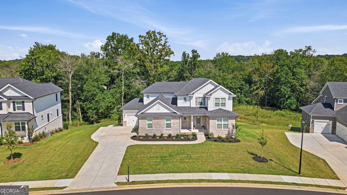 7 bedroom, 6.5 bathroom, 6,307 sq ft single family residence for sale at 6715 Settingdown Creek Drive, Dawsonville, GA 30534 — photo 2