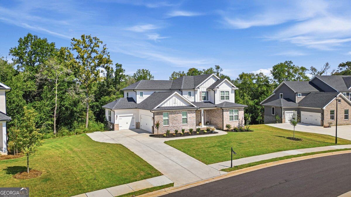 7 bedroom, 6.5 bathroom, 6,307 sq ft single family residence for sale at 6715 Settingdown Creek Drive, Dawsonville, GA 30534 — photo 1 of 53