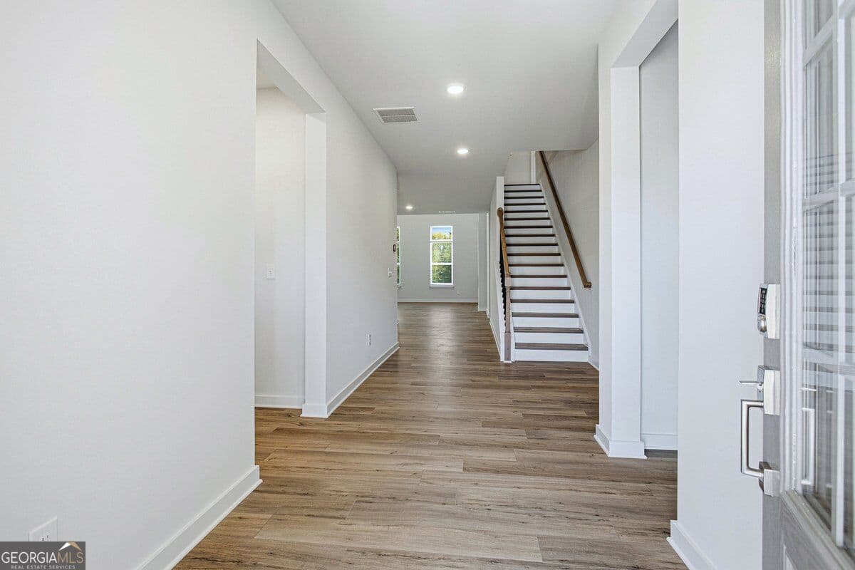 7 bedroom, 6.5 bathroom, 6,307 sq ft single family residence for sale at 6715 Settingdown Creek Drive, Dawsonville, GA 30534 — photo 5