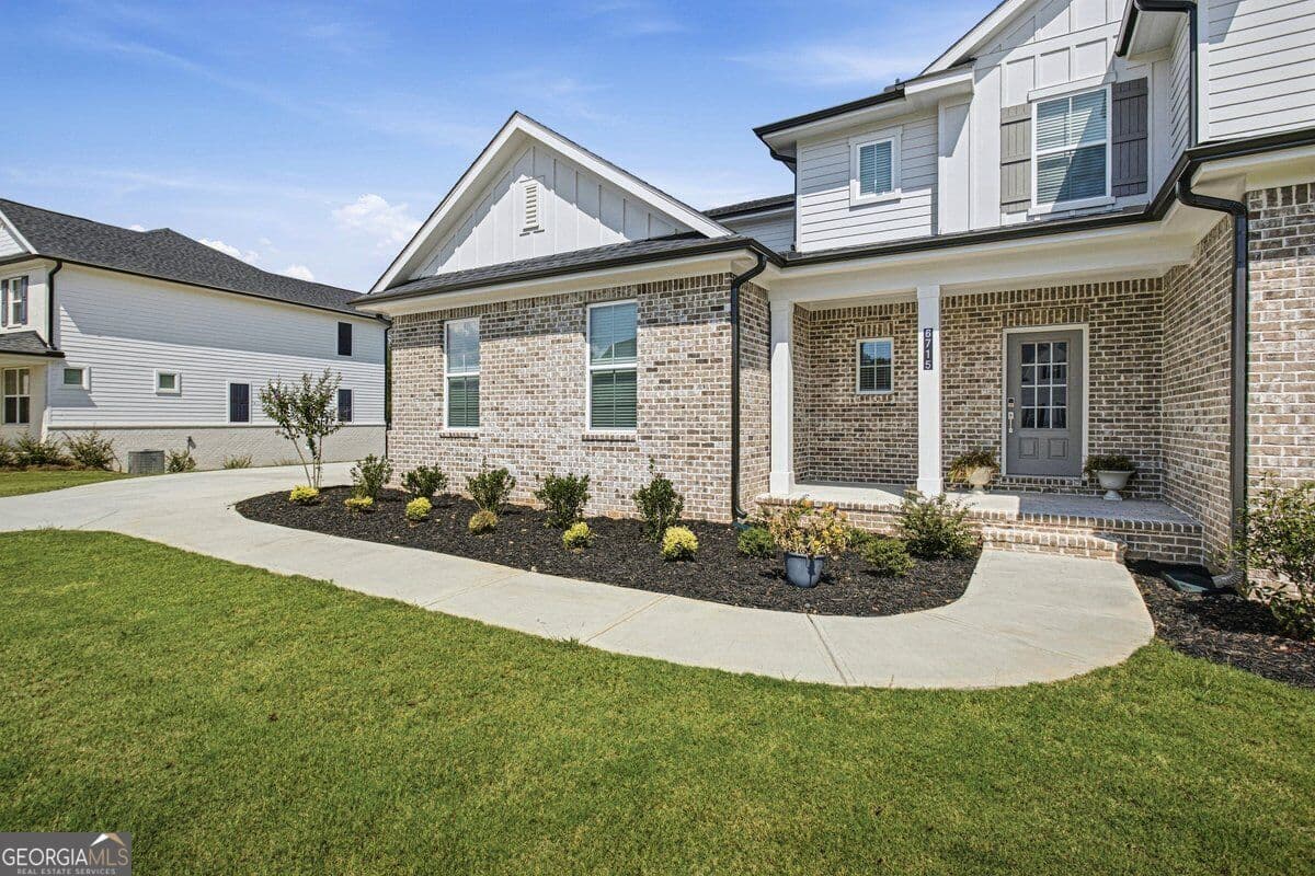 7 bedroom, 6.5 bathroom, 6,307 sq ft single family residence for sale at 6715 Settingdown Creek Drive, Dawsonville, GA 30534 — photo 4