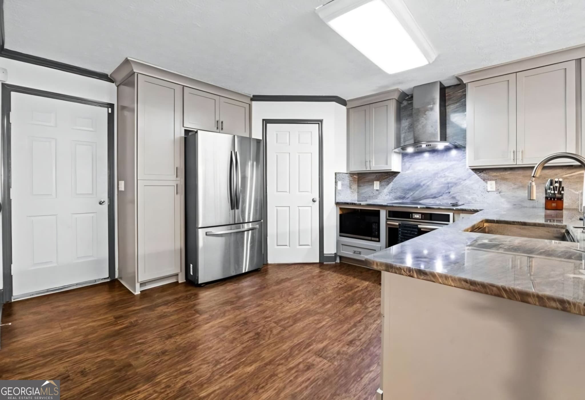 5 bedroom, 4 bathroom, 3,831 sq ft single family residence for sale at 10208 Hemlock Way, Jonesboro, GA 30238 — photo 8