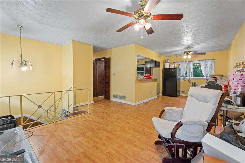 4 bedroom, 2.5 bathroom, 2,214 sq ft single family residence for sale at 1140 Pineglen Drive, Riverdale, GA 30296 — photo 9