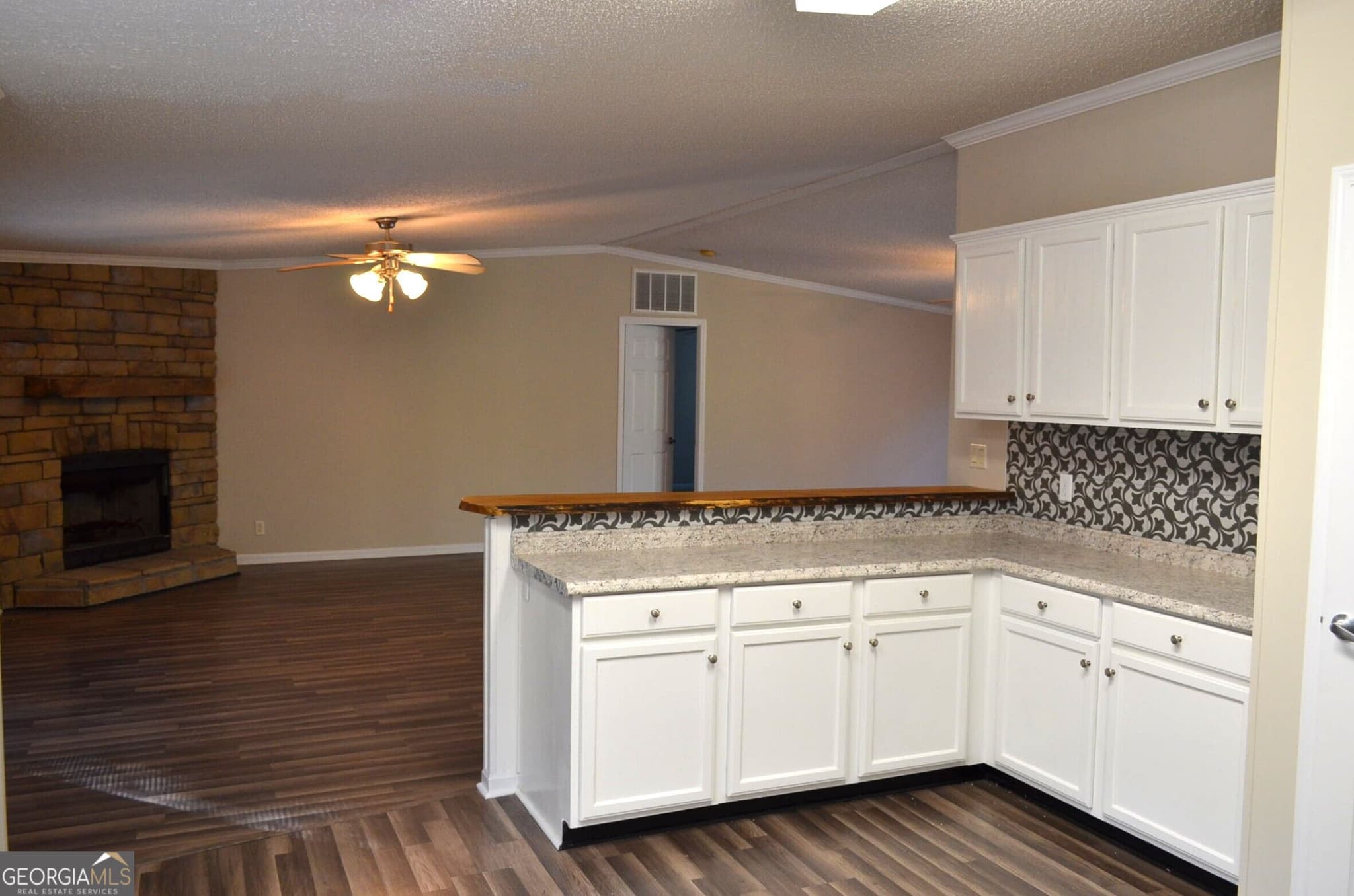 4 bedroom, 2 bathroom, 2,387 sq ft manufactured home,single family residence for sale at 2354 Old Knoxville Road, Knoxville, GA 31050 — photo 7
