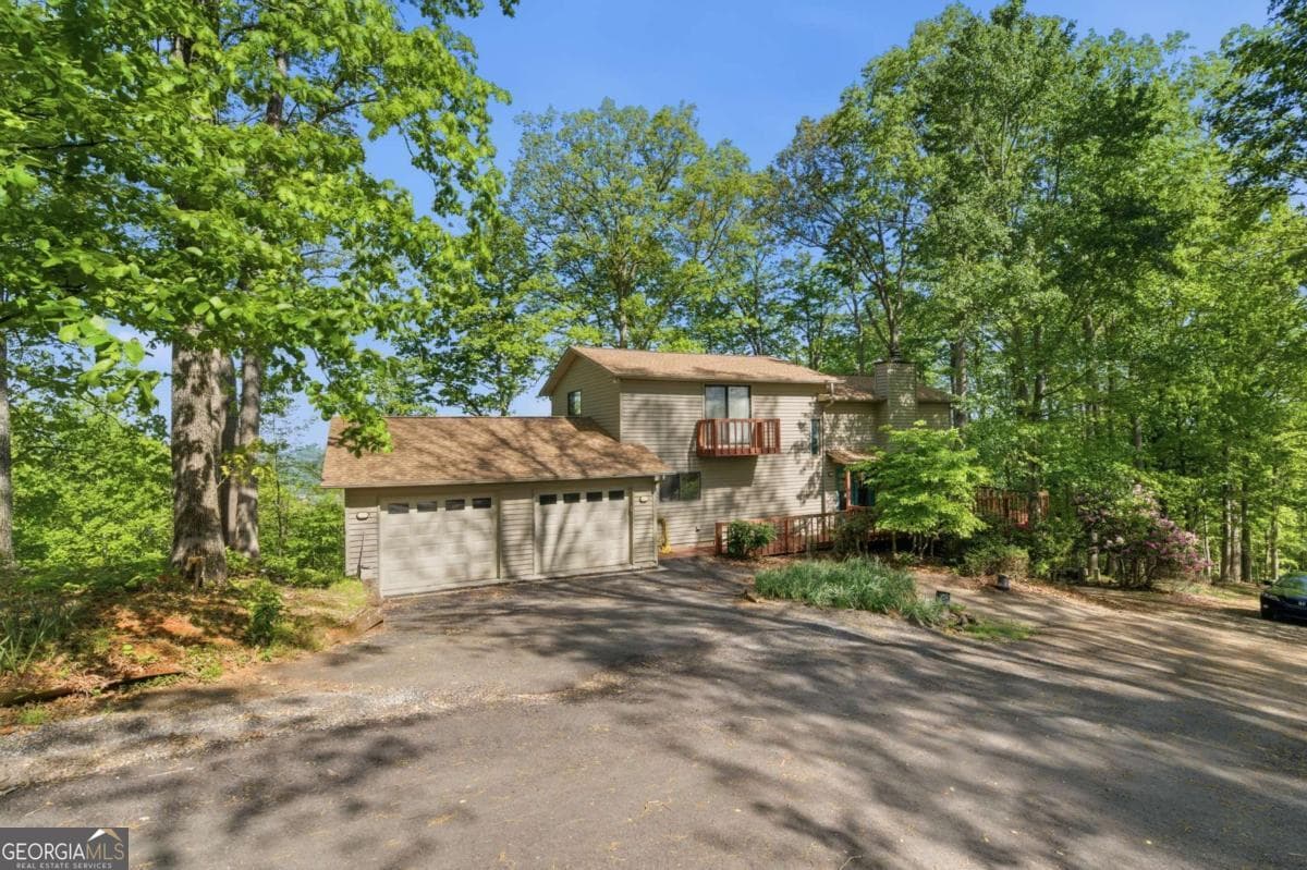 3 bedroom, 3.5 bathroom, 3,080 sq ft single family residence for sale at 860 Frog Pond Road 57, Hiawassee, GA 30546 — photo 2