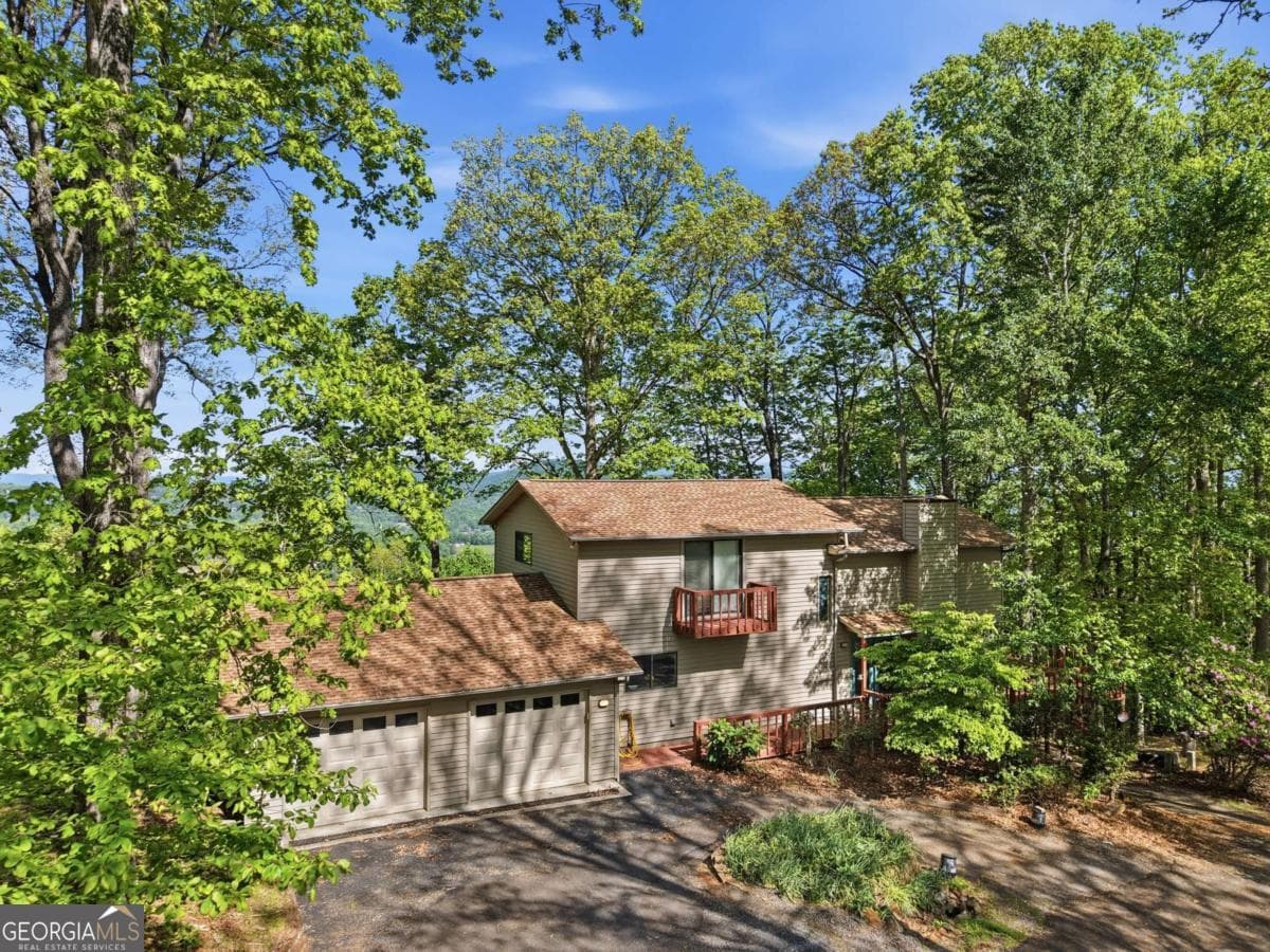 3 bedroom, 3.5 bathroom, 3,080 sq ft single family residence for sale at 860 Frog Pond Road 57, Hiawassee, GA 30546 — photo 3