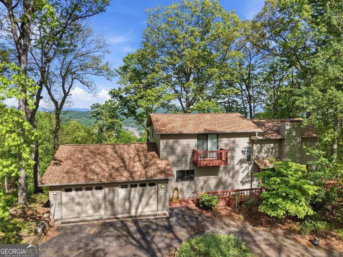3 bedroom, 3.5 bathroom, 3,080 sq ft single family residence for sale at 860 Frog Pond Road 57, Hiawassee, GA 30546 — photo 4