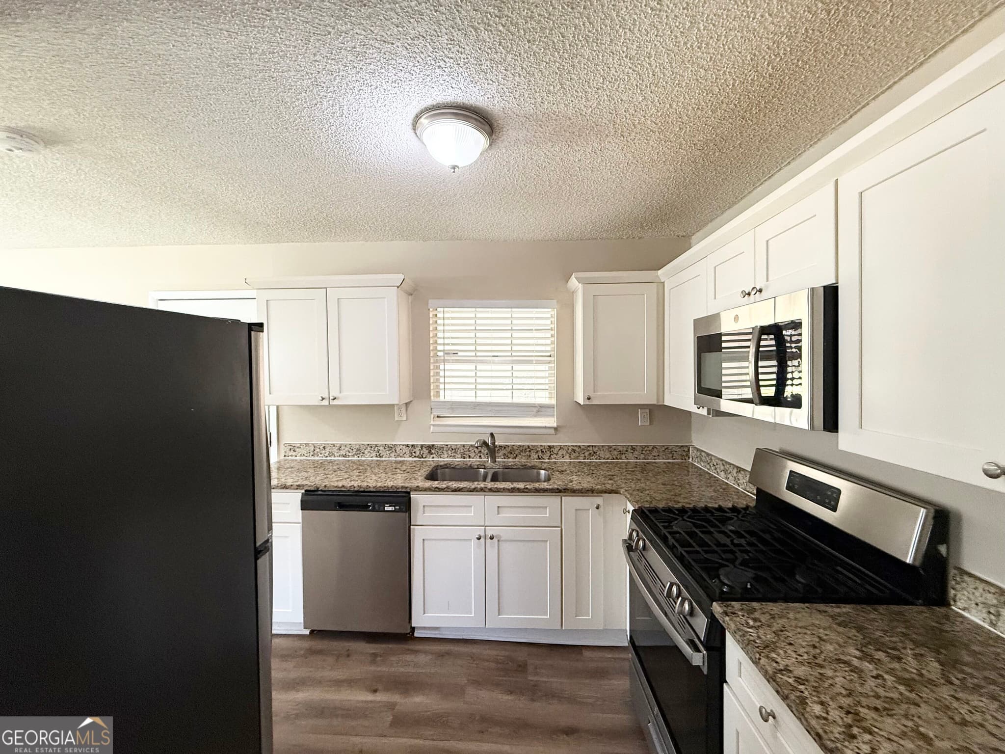 3 bedroom, 1.5 bathroom, 1,092 sq ft single family residence for sale at 674 Lyric Way, Atlanta, GA 30318 — photo 7