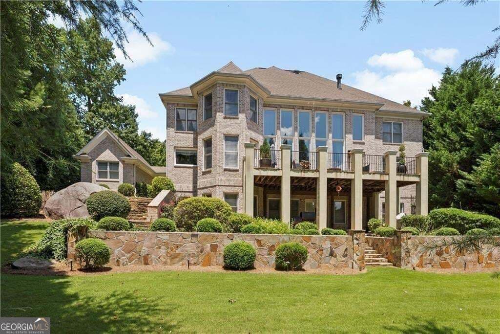 6 bedroom, 5.5 bathroom, 7,368 sq ft single family residence for sale at 4064 Lyon Boulevard, Atlanta, GA 30331 — photo 2
