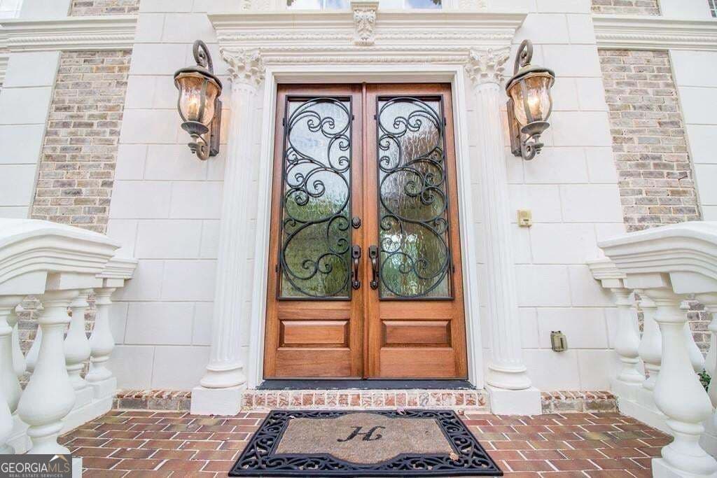 6 bedroom, 5.5 bathroom, 7,368 sq ft single family residence for sale at 4064 Lyon Boulevard, Atlanta, GA 30331 — photo 6