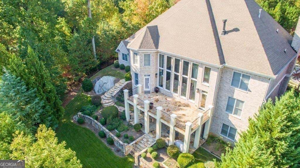 6 bedroom, 5.5 bathroom, 7,368 sq ft single family residence for sale at 4064 Lyon Boulevard, Atlanta, GA 30331 — photo 4