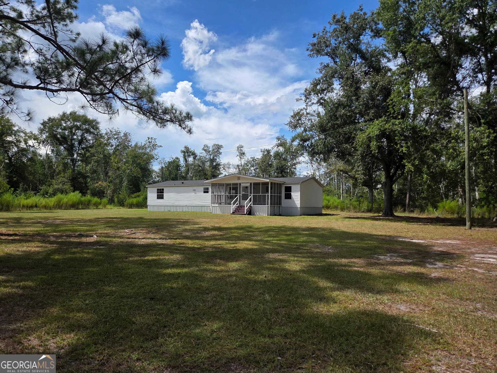 3 bedroom, 2 bathroom, 1,960 sq ft manufactured home,single family residence for sale at 90 Fisher Road, Hazlehurst, GA 31539