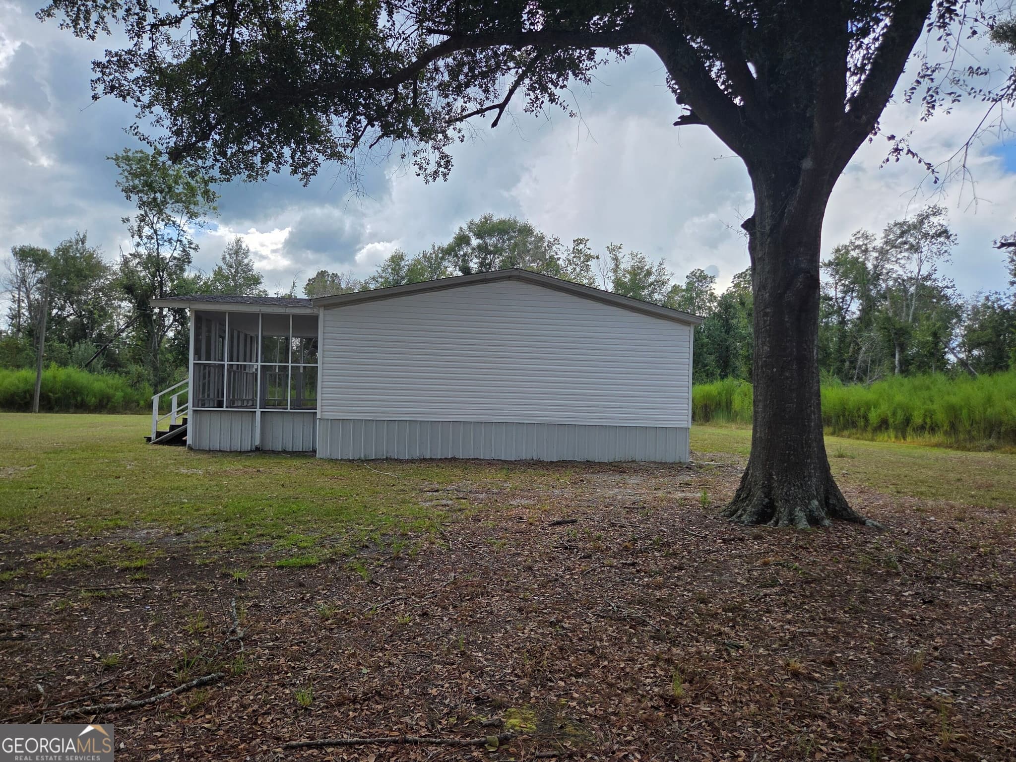 3 bedroom, 2 bathroom, 1,960 sq ft manufactured home,single family residence for sale at 90 Fisher Road, Hazlehurst, GA 31539 — photo 5
