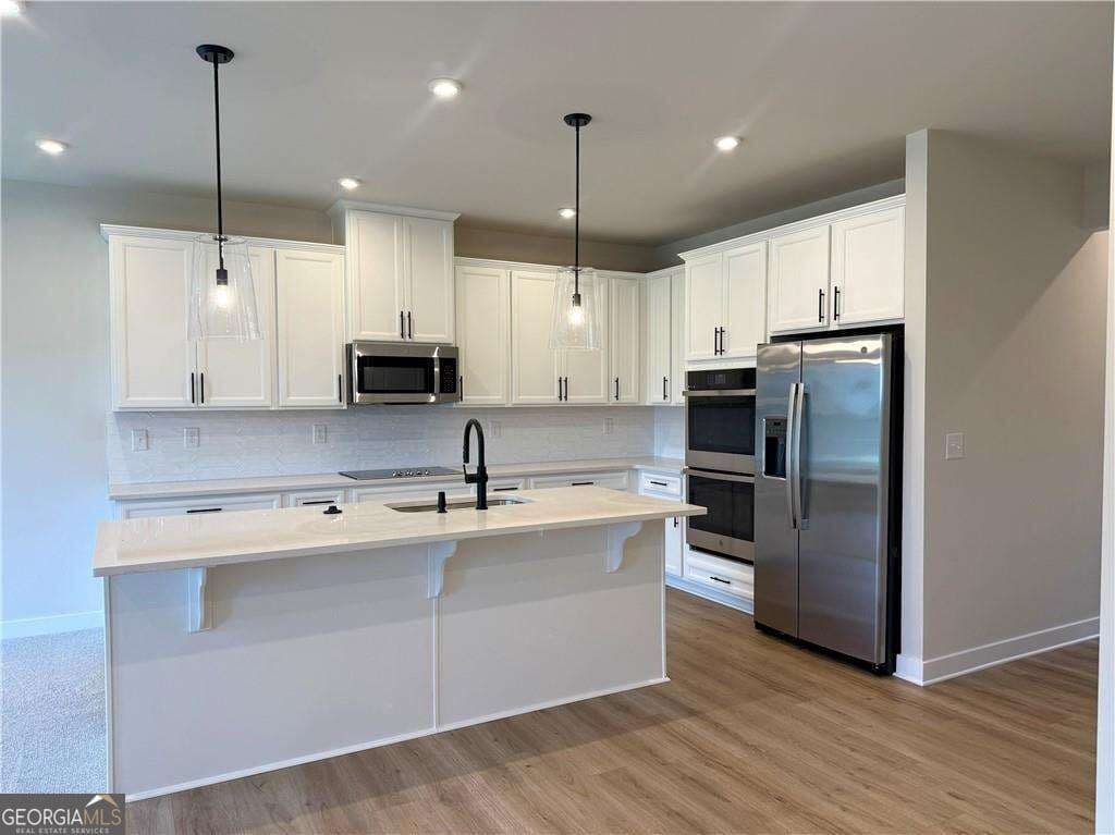 3 bedroom, 2.5 bathroom townhouse for sale at 2459 Green Juniper Way, Gainesville, GA 30507 — photo 1 of 25