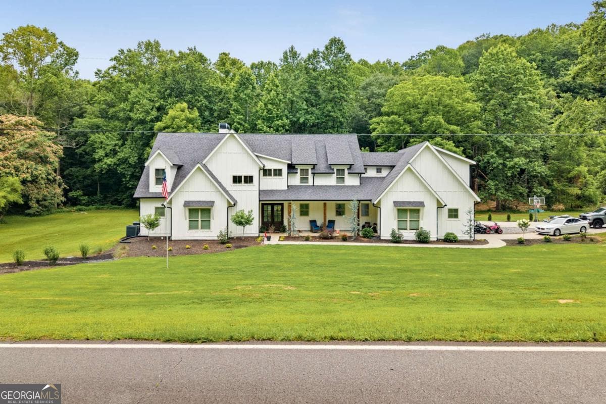 6 bedroom, 5.5 bathroom, 5,191 sq ft single family residence for sale at 1485 Duffy Grizzle Road, Dahlonega, GA 30533 — photo 2
