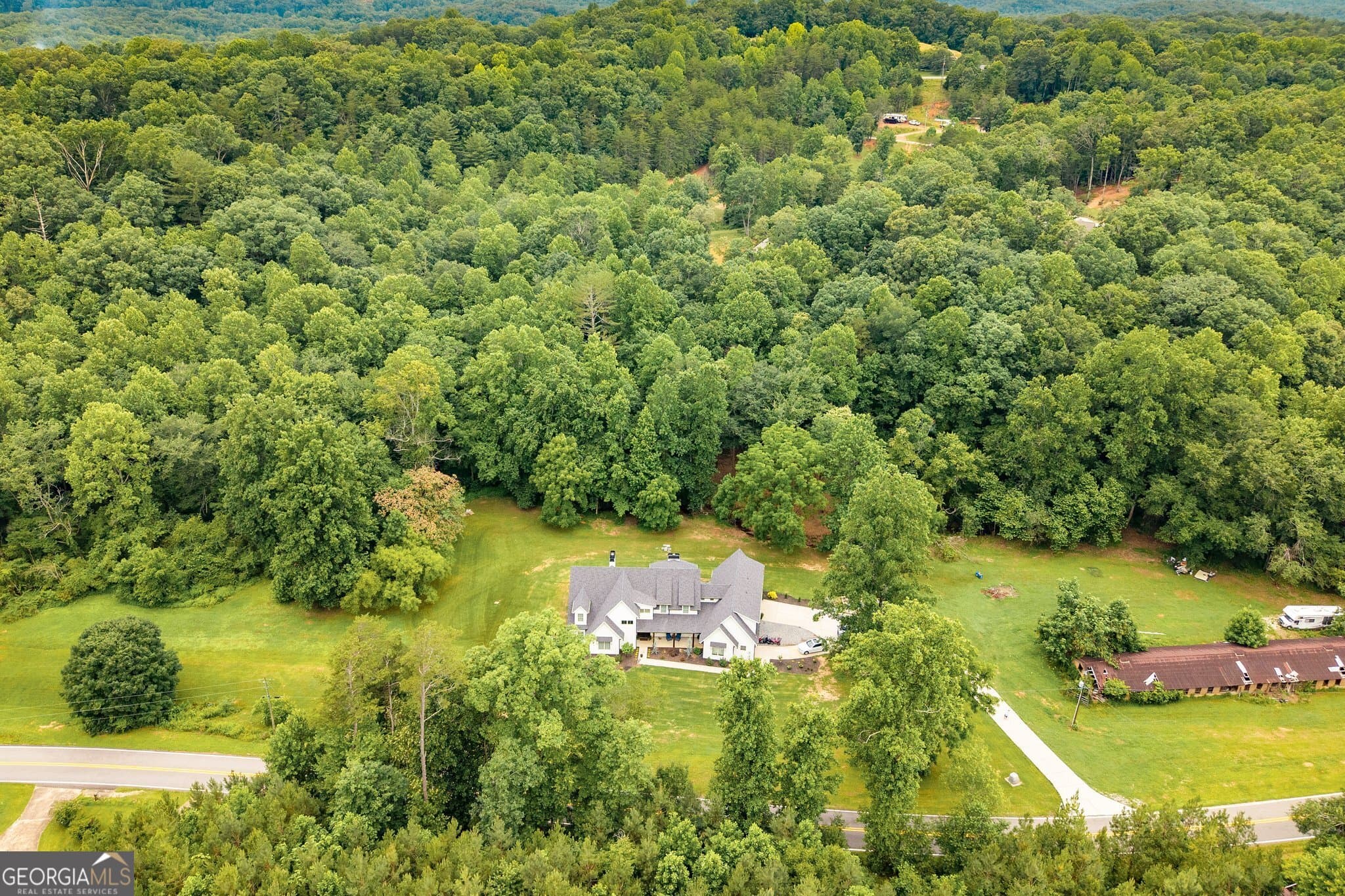 6 bedroom, 5.5 bathroom, 5,191 sq ft single family residence for sale at 1485 Duffy Grizzle Road, Dahlonega, GA 30533 — photo 7
