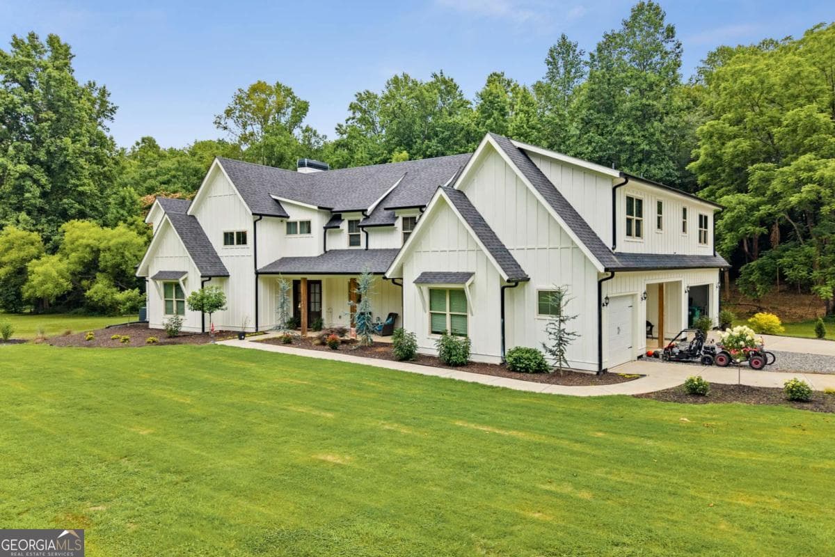 6 bedroom, 5.5 bathroom, 5,191 sq ft single family residence for sale at 1485 Duffy Grizzle Road, Dahlonega, GA 30533 — photo 3
