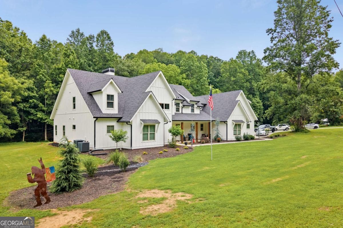 6 bedroom, 5.5 bathroom, 5,191 sq ft single family residence for sale at 1485 Duffy Grizzle Road, Dahlonega, GA 30533 — photo 4