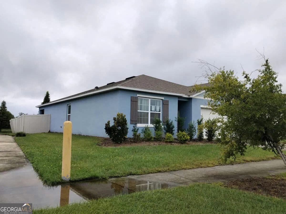 4 bedroom, 2 bathroom, 1,812 sq ft single family residence for sale at 5557 Siltstone Street, Lakeland, FL 33811 — photo 3