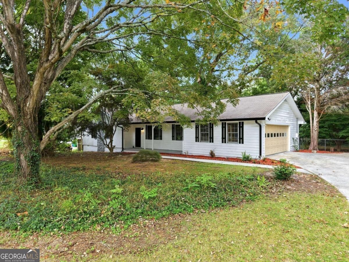 3 bedroom, 2 bathroom, 1,543 sq ft single family residence for sale at 3346 San Antonio Drive, Snellville, GA 30039 — photo 1 of 49