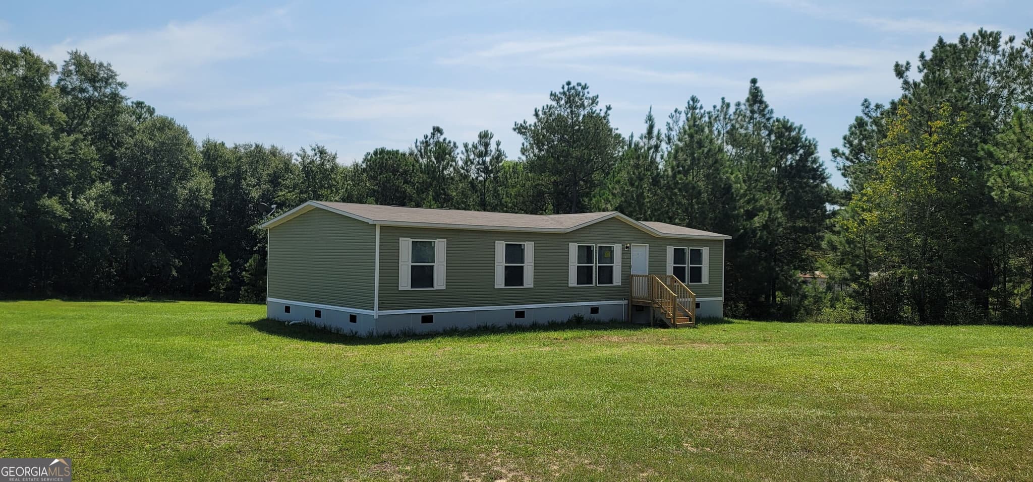 3 bedroom, 2 bathroom, 1,680 sq ft manufactured home,single family residence for sale at 121 Pecan Grove Road, Sylvania, GA 30467 — photo 2