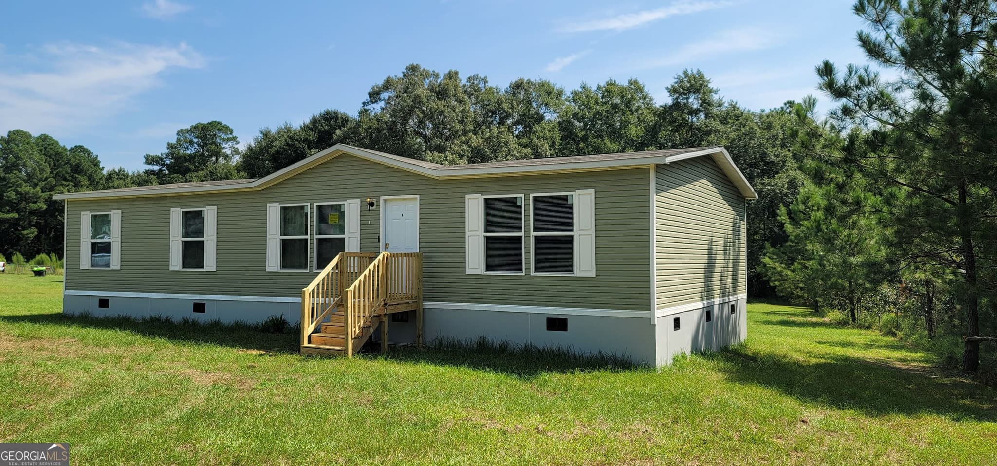 3 bedroom, 2 bathroom, 1,680 sq ft manufactured home,single family residence for sale at 121 Pecan Grove Road, Sylvania, GA 30467 — photo 3