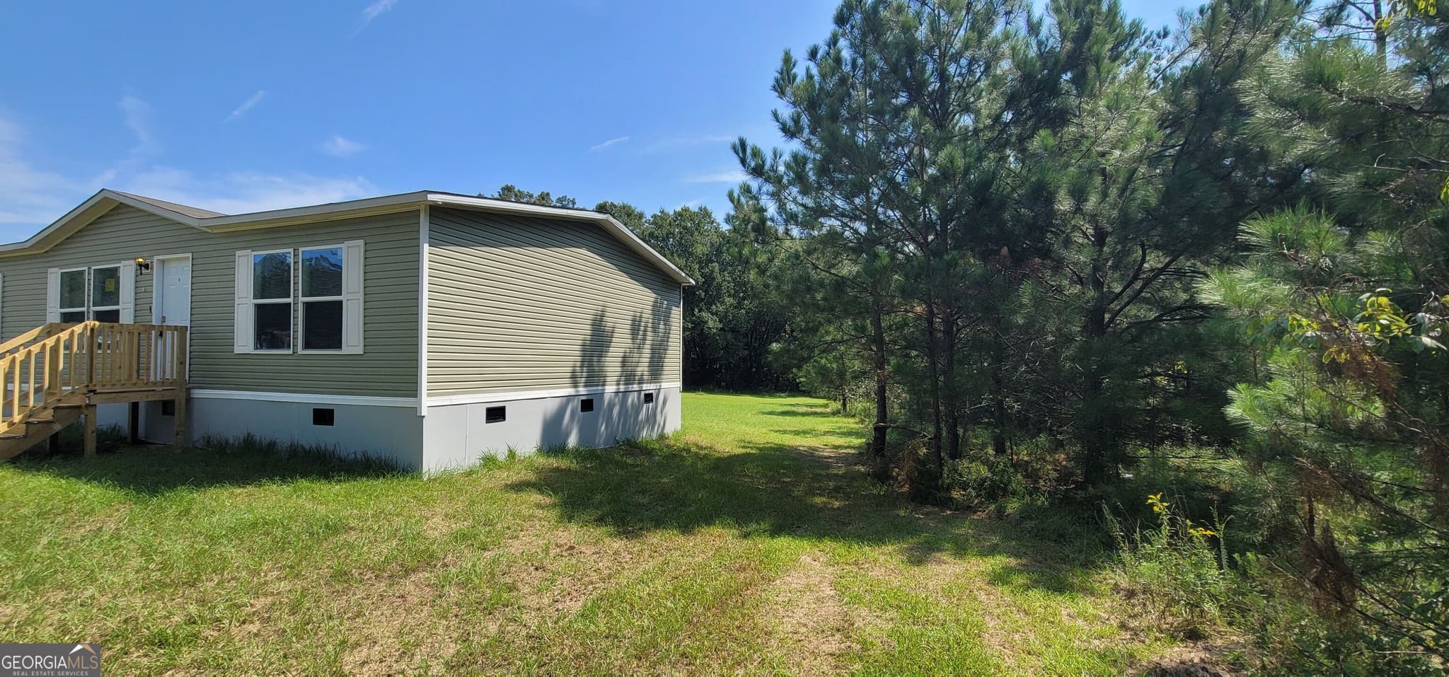 3 bedroom, 2 bathroom, 1,680 sq ft manufactured home,single family residence for sale at 121 Pecan Grove Road, Sylvania, GA 30467 — photo 4