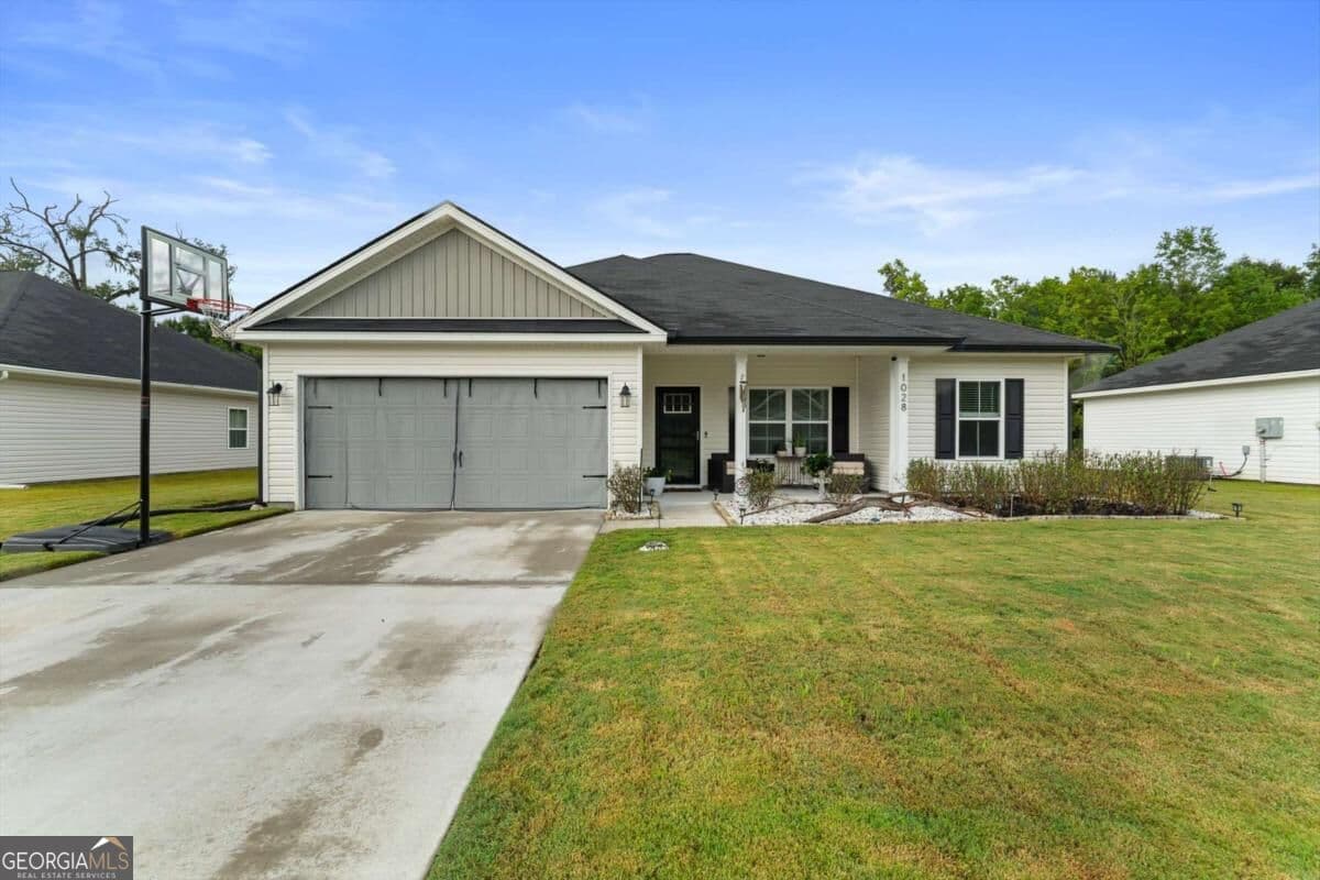 4 bedroom, 2 bathroom, 1,682 sq ft single family residence for sale at 1028 Meloney Drive, Hinesville, GA 31313