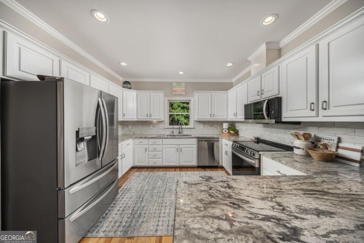 5 bedroom, 3.5 bathroom, 3,654 sq ft single family residence for sale at 1480 Plantation Drive, Greensboro, GA 30642 — photo 10