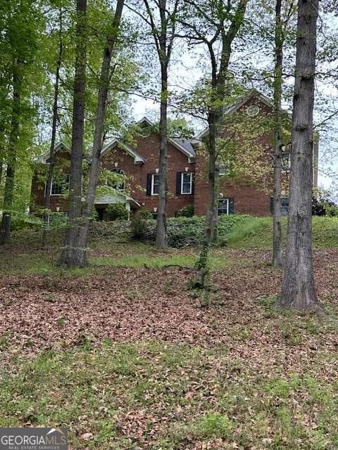 4 bedroom, 4 bathroom, 6,201 sq ft single family residence sold at 8010 Scudder Way, Ball Ground, GA 30107